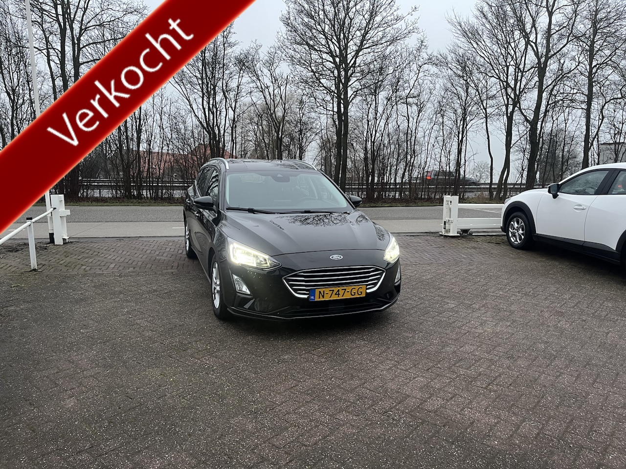 Ford Focus Wagon - 1.0 EcoBoost Hybrid Edition Business CAMERA WINTER PACK NAVI - AutoWereld.nl