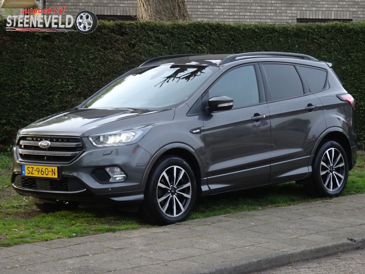 Ford Kuga - 1.5 ST Line met Camera en Trekhaak Distributie V.V. - AutoWereld.nl