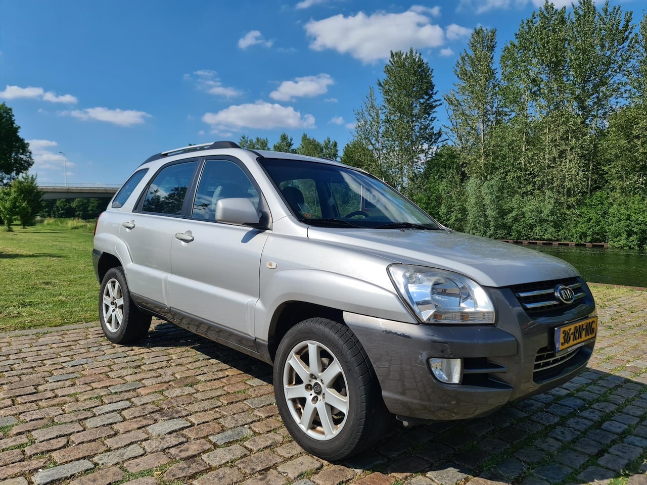 Kia Sportage - 2.7 V6 Adventure 4WD Automaat 2e eigenaar leerbekeleding cruis control parkeer sensor airc - AutoWereld.nl