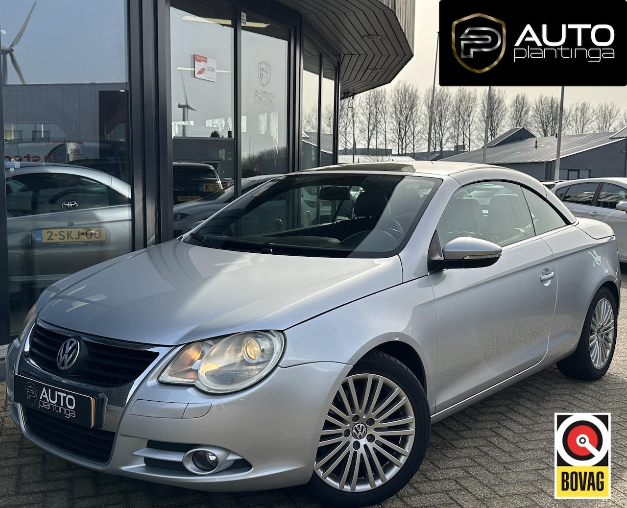 Volkswagen Eos - 1.4 TSI 160PK | ZEER NETTE STAAT | Lederen Bekleding | Stoelverwarming | Parkeersensoren | - AutoWereld.nl