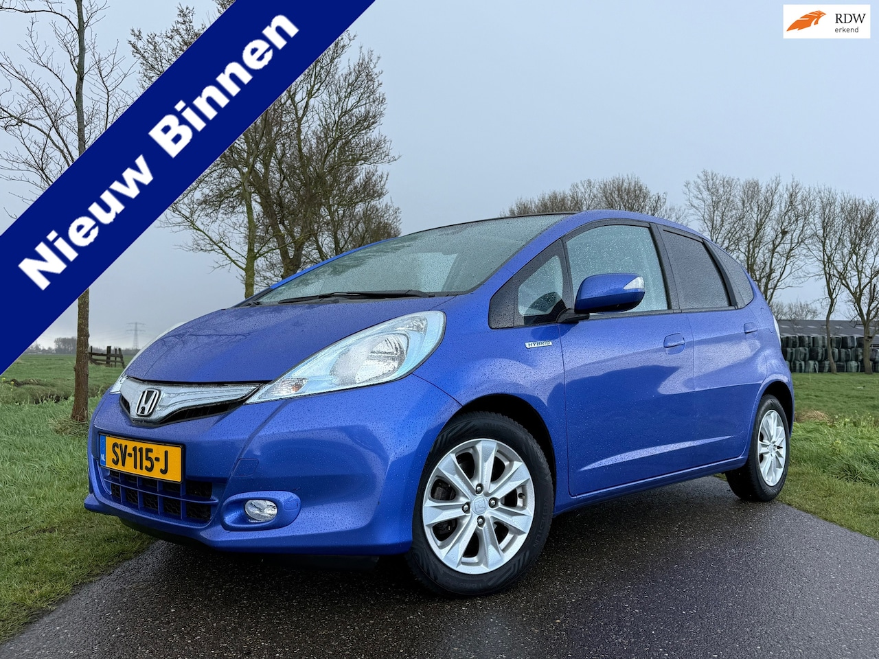 Honda Jazz - 1.4 Hybrid Elegance Automaat | 1e Eigenaar | Panoramadak | Stoelverwarming | Clima | 15" V - AutoWereld.nl