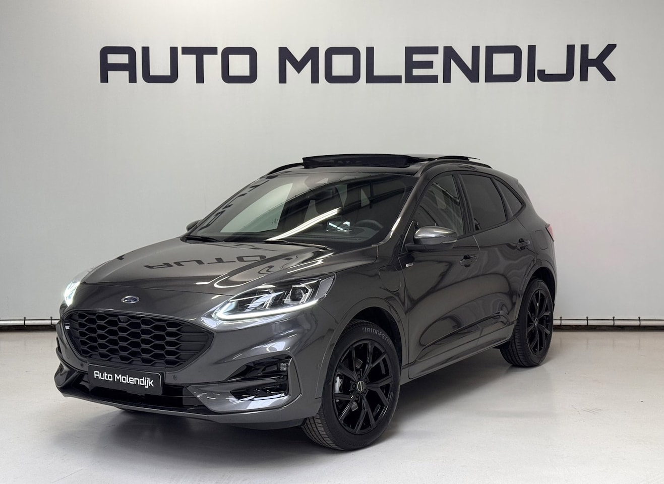 Ford Kuga - 2.5 PHEV ST-Line X Pano / Alcantara / HuD / B&O / el. klep / 21.000 km! - AutoWereld.nl
