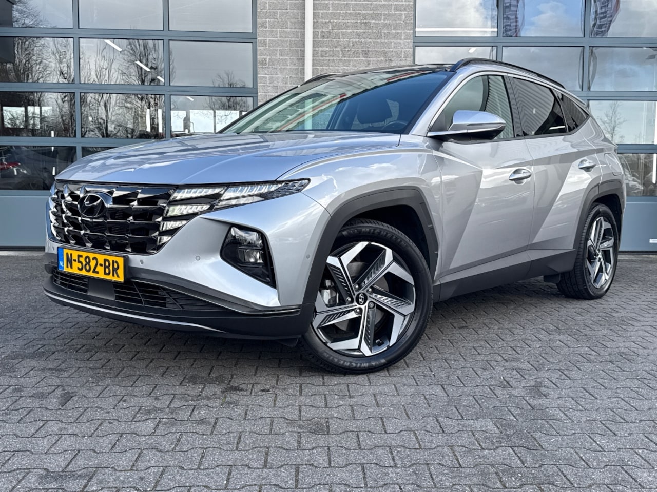 Hyundai Tucson - 1.6 T-GDI PHEV Premium Sky 4WD |TREKHAAK|SCHUIFDAK| - AutoWereld.nl
