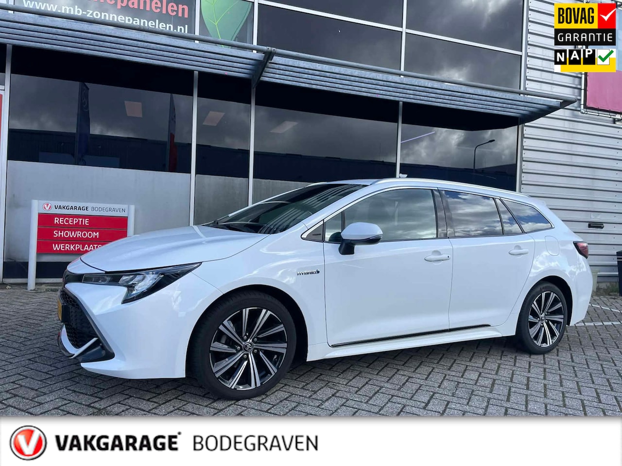 Toyota Corolla Touring Sports - 1.8 Hybrid TeamNL / trekhaak / camera - AutoWereld.nl