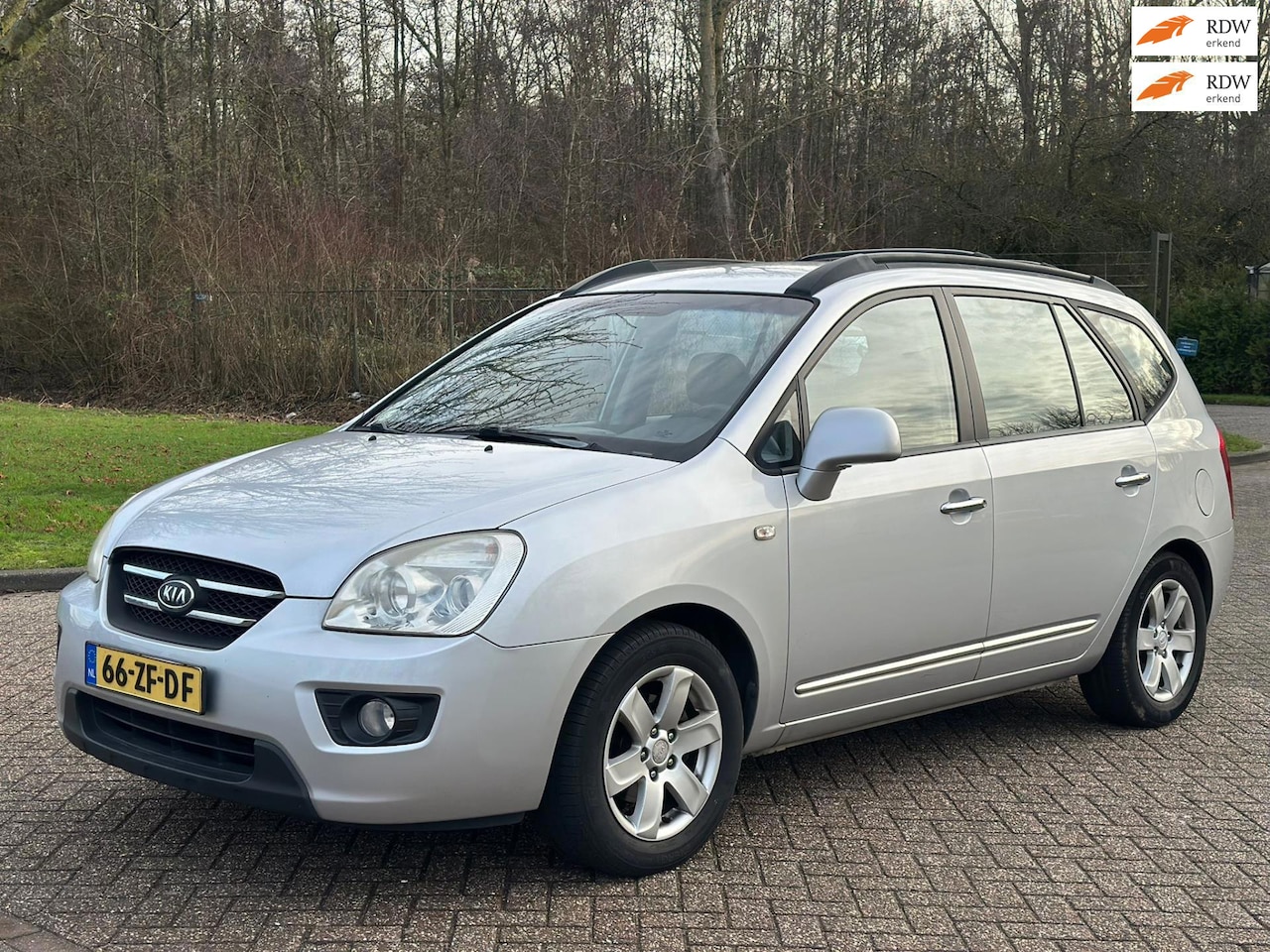 Kia Carens - 2.0 CVVT X-ecutive CLIMA CRUISE TREKHAAK - AutoWereld.nl