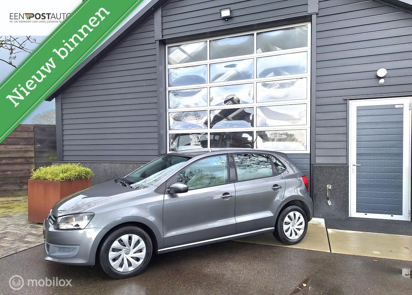 Volkswagen Polo - 1.4-16V Comfortline Navigatie, Airco, Cruise-Control, Bluetooth, Parkeersensoren. - AutoWereld.nl