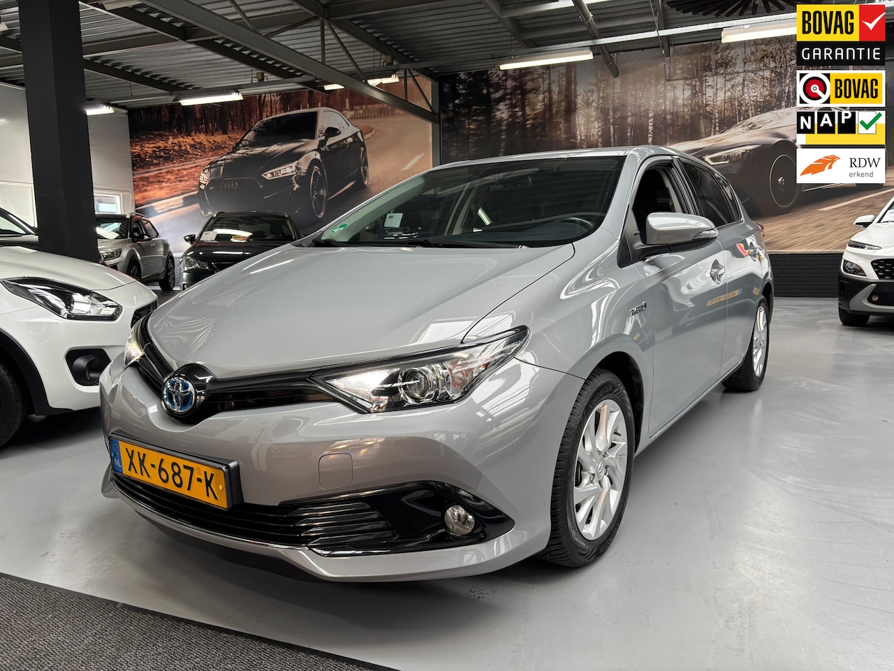 Toyota Auris - 1.8 Hybrid Energy Plus / Navigatie / Trekhaak - AutoWereld.nl