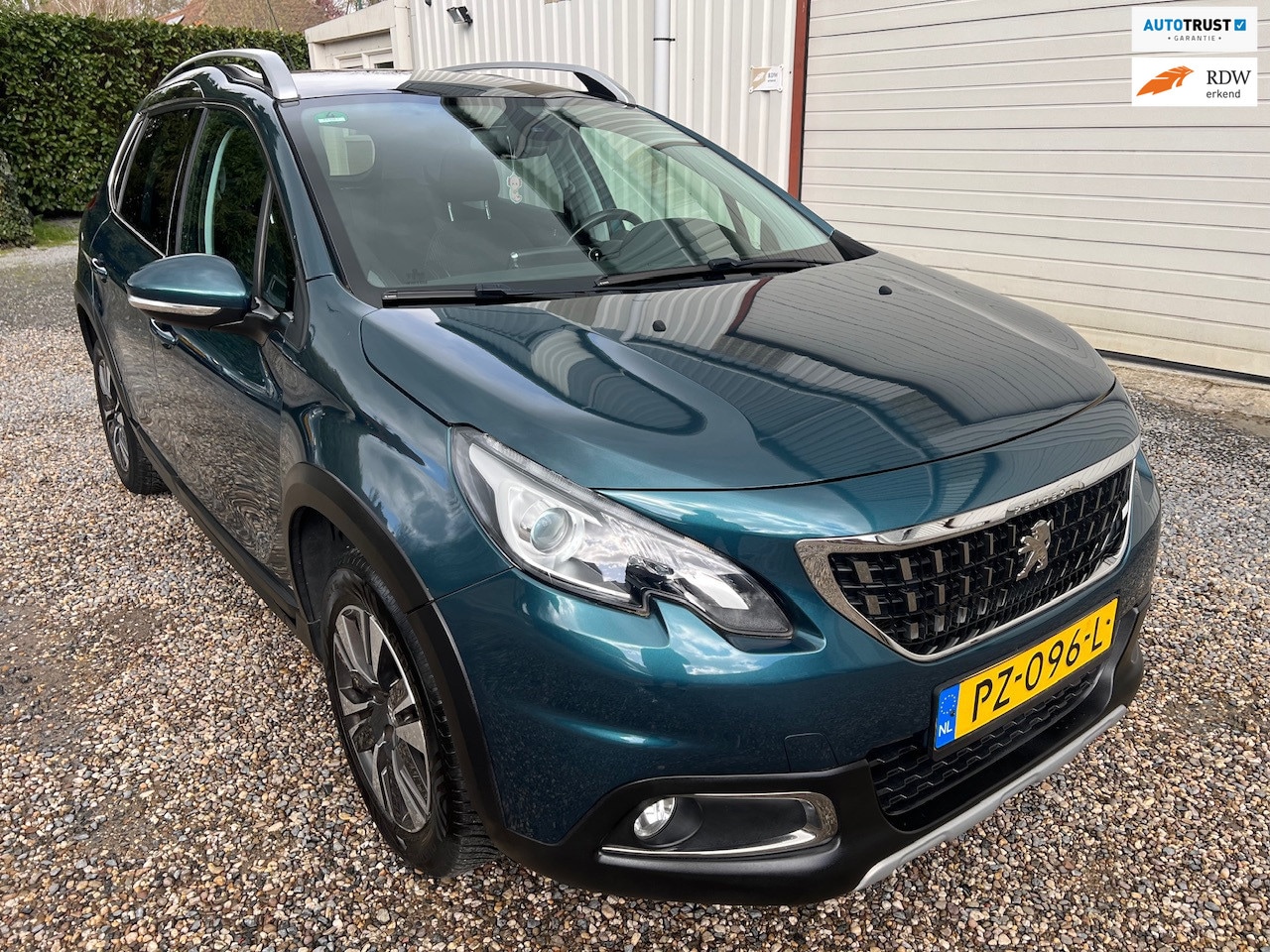 Peugeot 2008 - 1.2 PureTech AUT Allure DEALER-ONDHDN.PANORAMA.NAP! - AutoWereld.nl