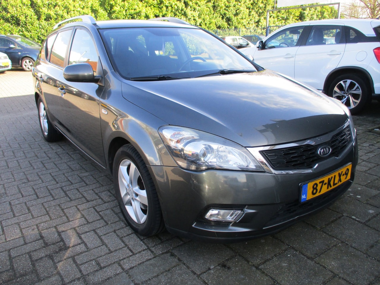 Kia Cee'd - 1.4 CVVT AIRCO! CRUISE! NAVI! TREKHAAK! - AutoWereld.nl
