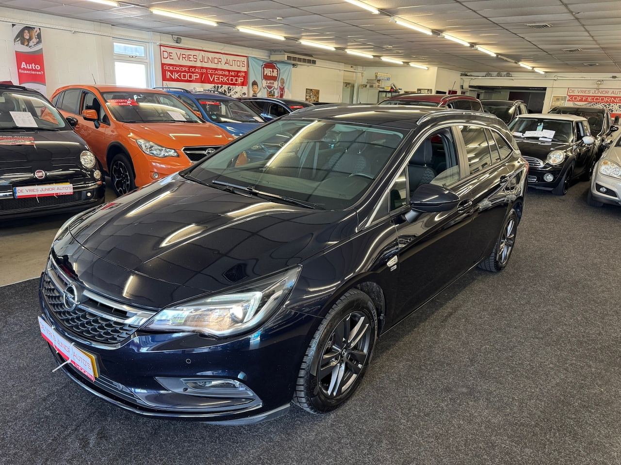 Opel Astra Sports Tourer - 1.0 Turbo 120 Jaar Edition. cruise/climate, camera/navi/BT, netjes onderhouden en veel mee - AutoWereld.nl