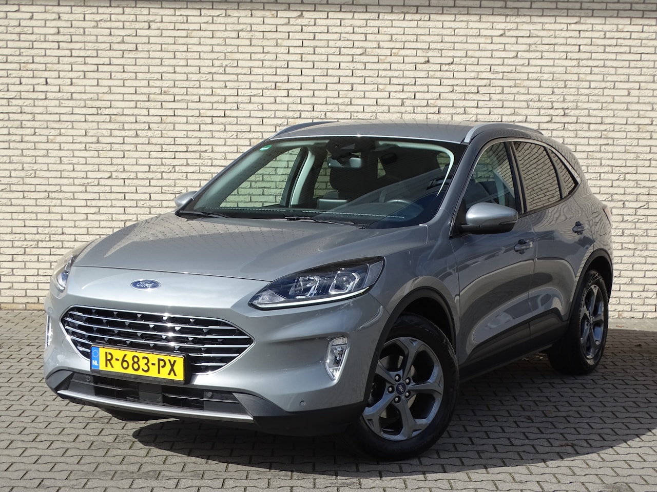 Ford Kuga - 1.5 Turbo 150pk Titanium | Trekhaak | 1800kg Trekgewicht | Winterpack | Cruise. | Privacy - AutoWereld.nl