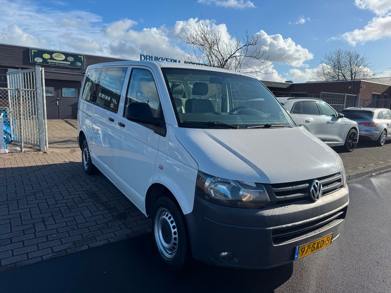 Volkswagen Transporter Kombi - 2.0 TDI L1H1 AIRCO 9 PERSON - AutoWereld.nl