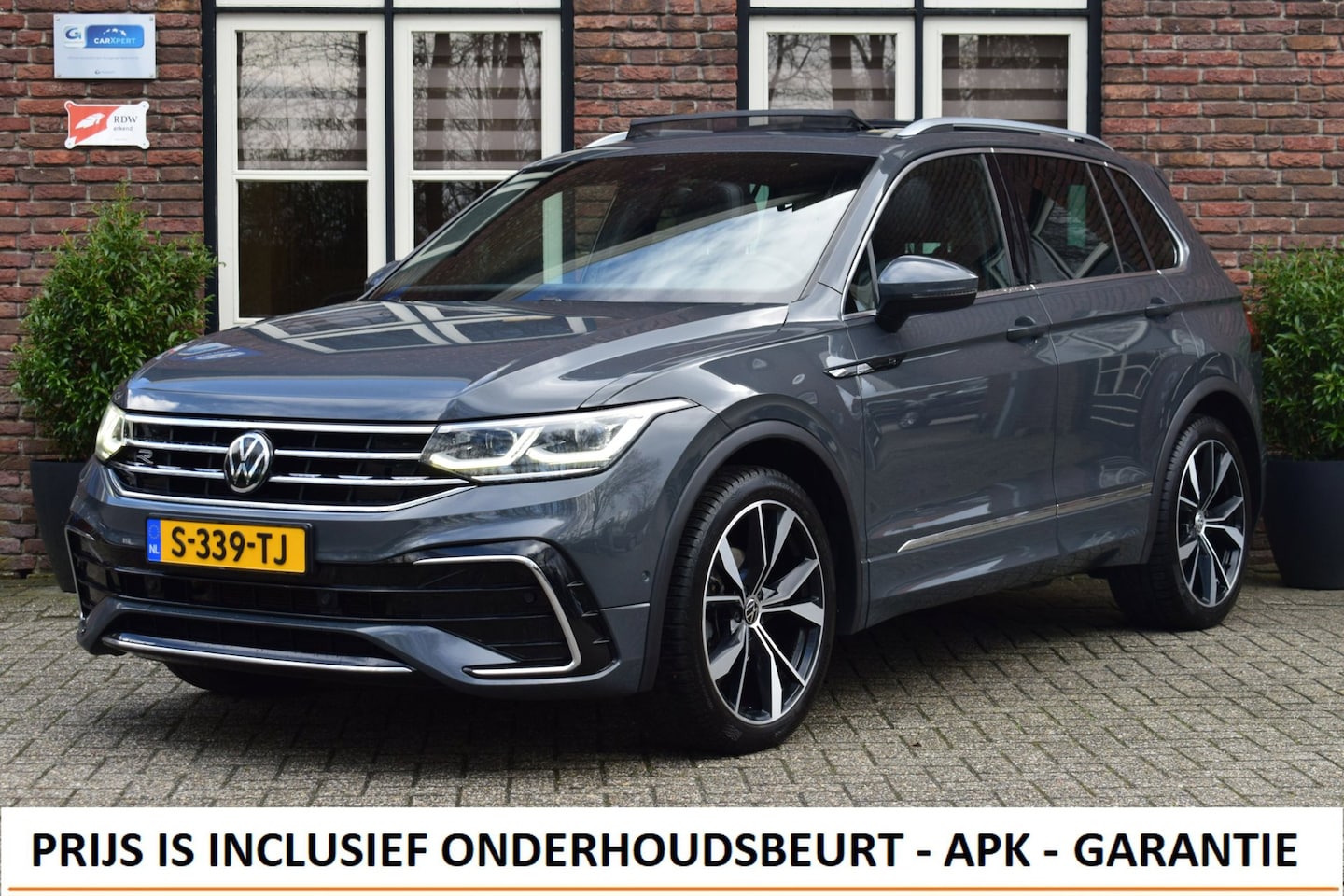 Volkswagen Tiguan - 1.5 TSI DSG Aut. R-Line Business+ Trekhaak | Panoramadak | Camera | Keyless - AutoWereld.nl