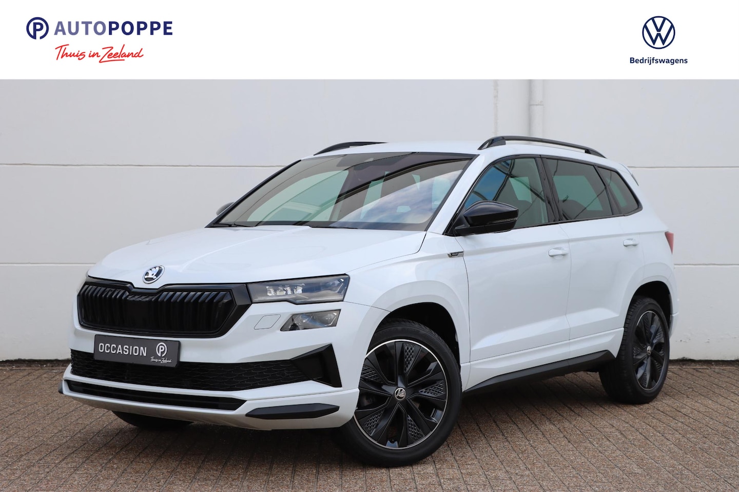 Skoda Karoq - 1.5 TSI Sportline 150pk DSG7 Voor+achterbankverwarming | Stuurverwarming | Carplay | trave - AutoWereld.nl