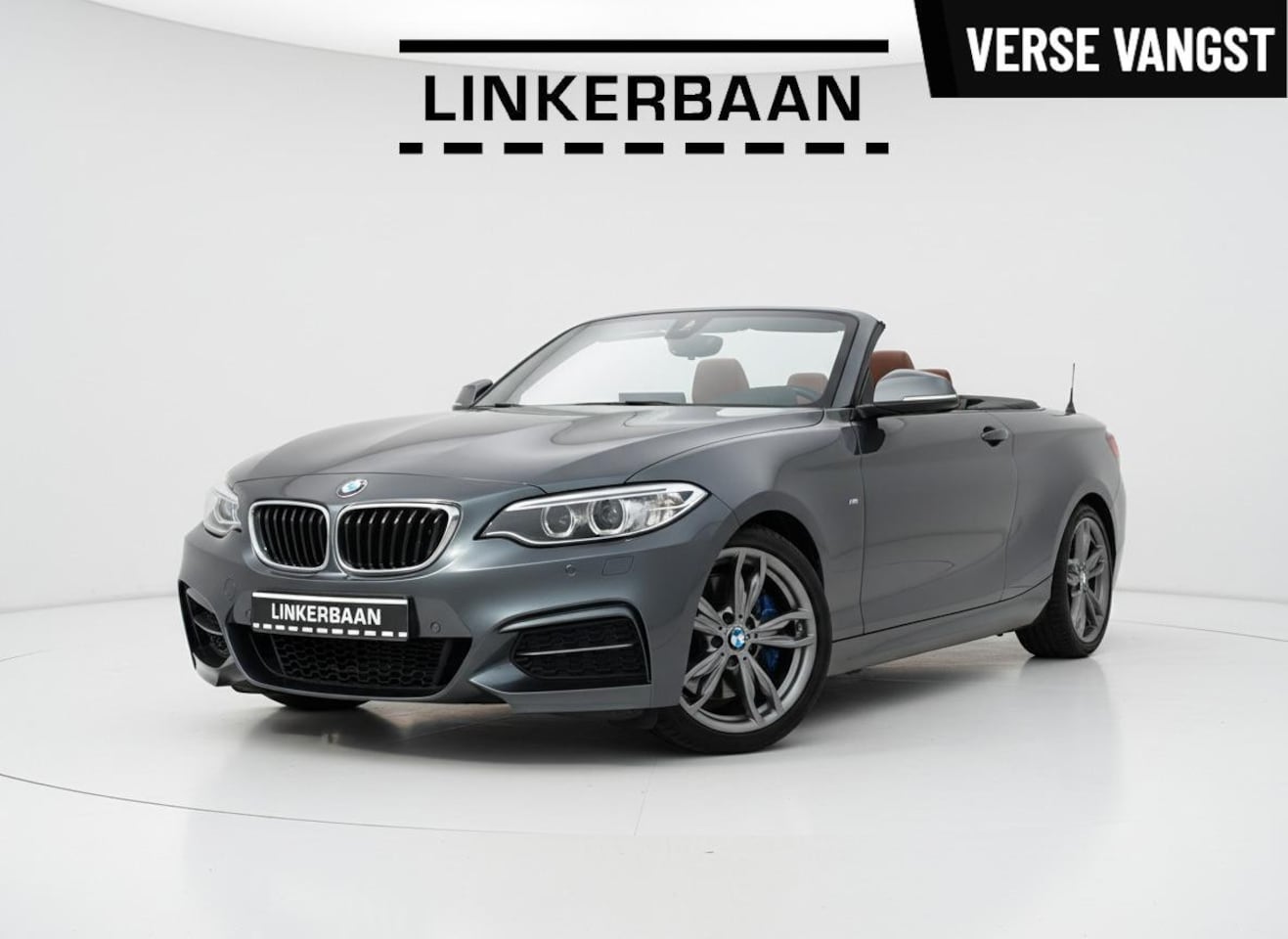 BMW 2-serie Cabrio - M235i Cabrio High Executive | Leder | H&K | Camera | Navi | 1 eig | NL Auto | - AutoWereld.nl