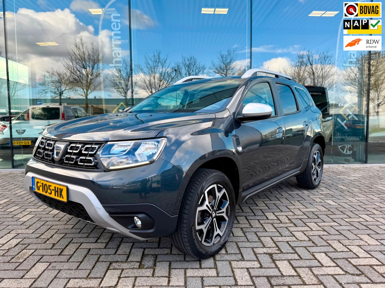 Dacia Duster - 1.3 TCe Prestige 1.3 TCe 130pk Prestige, NAP, CarPlay, Camera, PDC - AutoWereld.nl