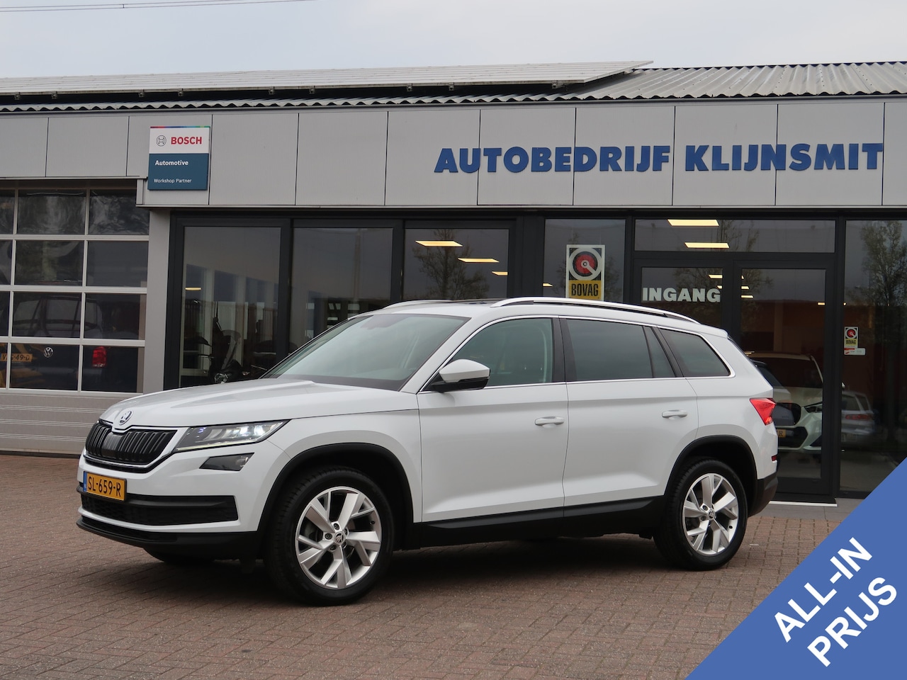 Skoda Kodiaq - 1.4 TSI Ambition Business | Panoramadak | Trekhaak | Camera - AutoWereld.nl