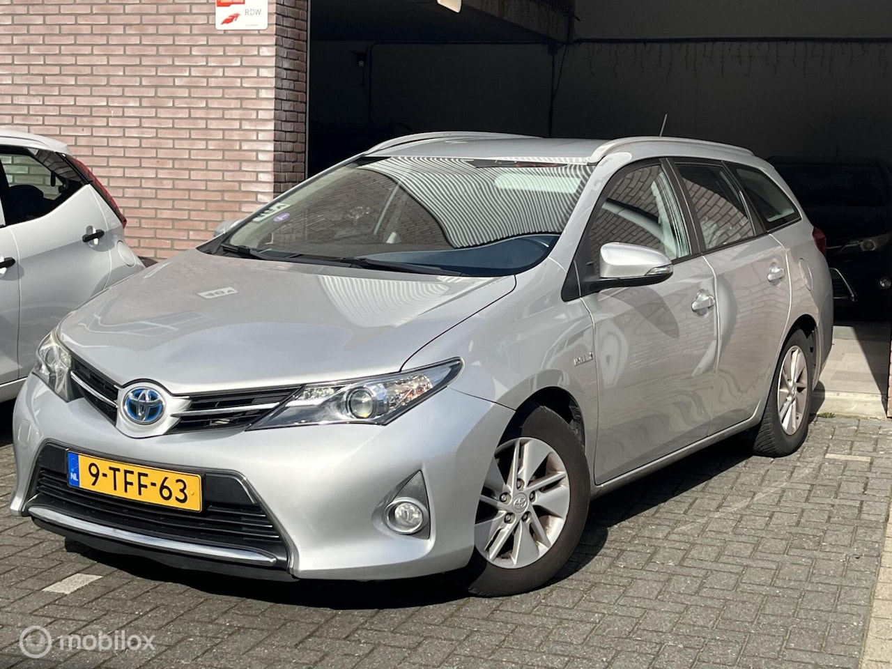 Toyota Auris Touring Sports - 1.8 Hybrid bj 2014 Navi, Camera, NAP. Dealer onderhouden! - AutoWereld.nl