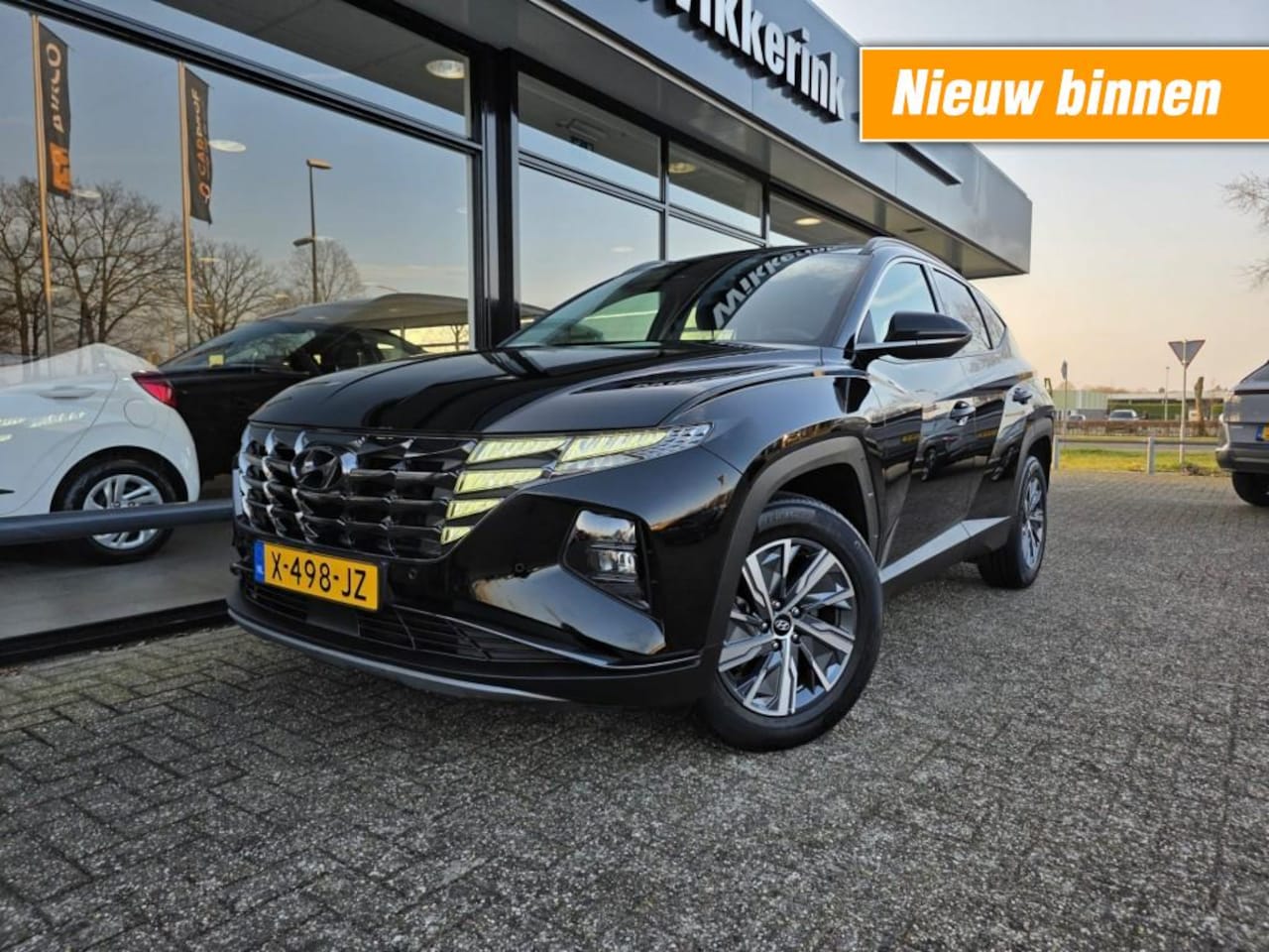 Hyundai Tucson - 1.6 T-GDI HEV COMF SMART ADAPTIEF/EL KOFFERKLEP - AutoWereld.nl