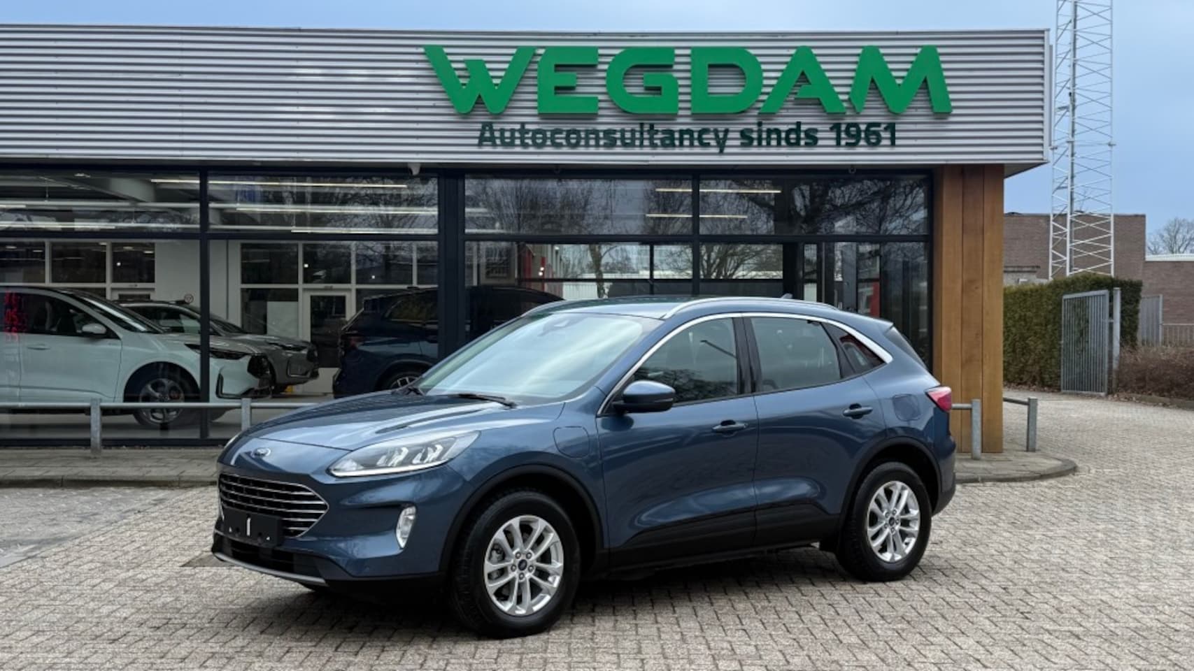 Ford Kuga - 2.5 PHEV TITANIUM / Winter pack - AutoWereld.nl