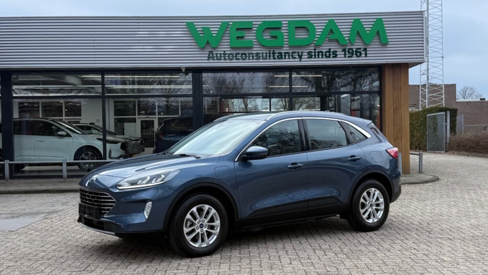 Ford Kuga - 2.5 PHEV TITANIUM / Trekhaak + Winter pack - AutoWereld.nl