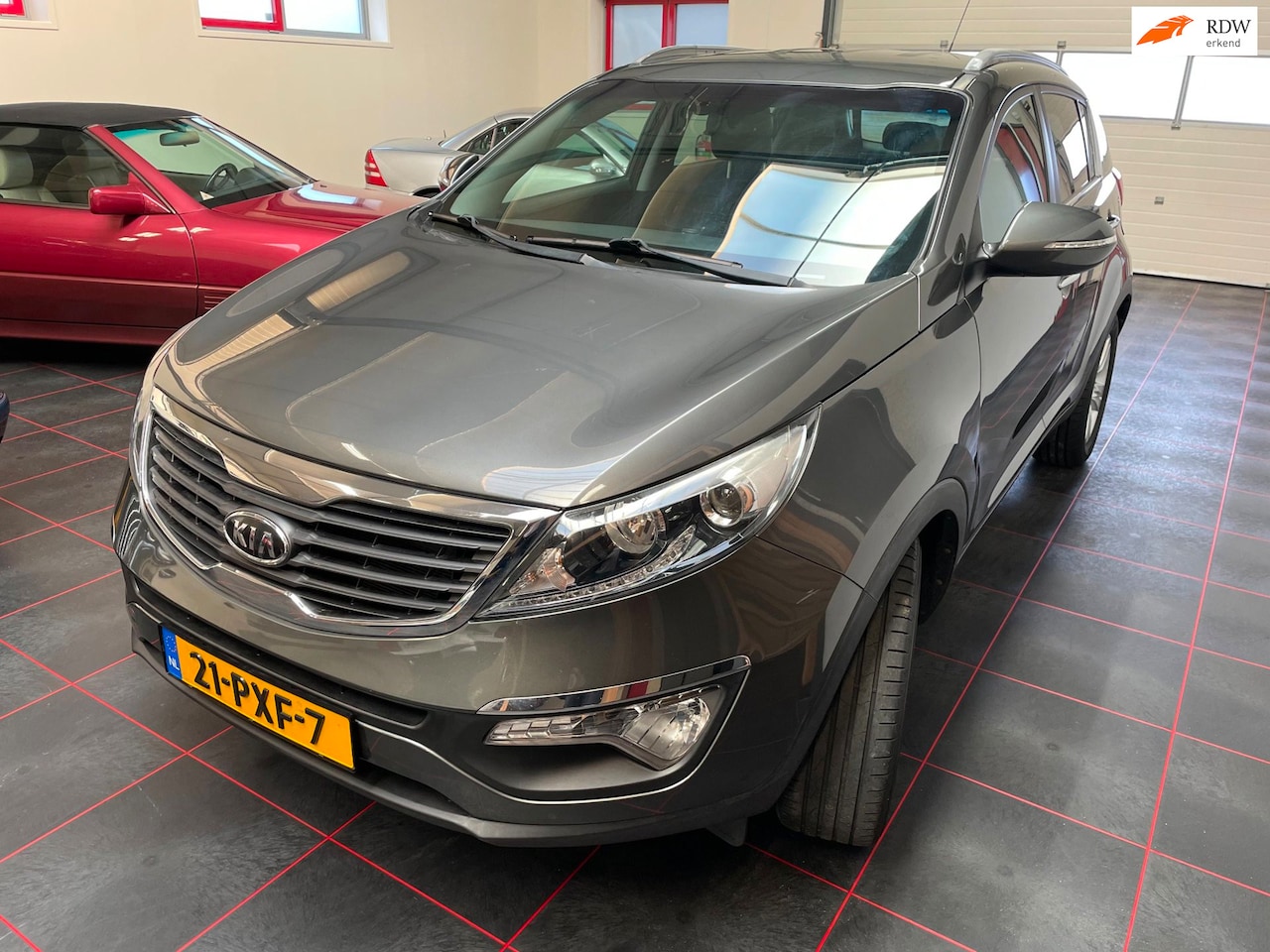 Kia Sportage - 1.6 GDI X-ecutive Plus Pack 1.6 GDI X-ecutive Plus Pack - AutoWereld.nl