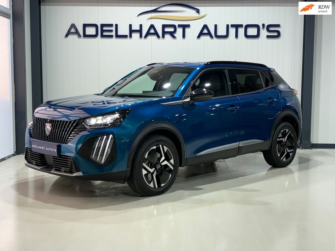 Peugeot 2008 - 1.2 Hybrid 145 Allure Automaat / Navigatie full map / 360 Camera / Cruise control / Keyles - AutoWereld.nl