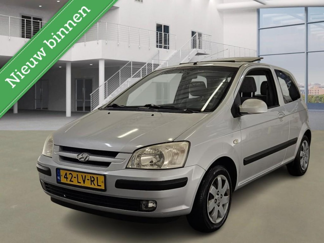 Hyundai Getz - 1.3i GLS PANO / AIRCO / NAP - AutoWereld.nl