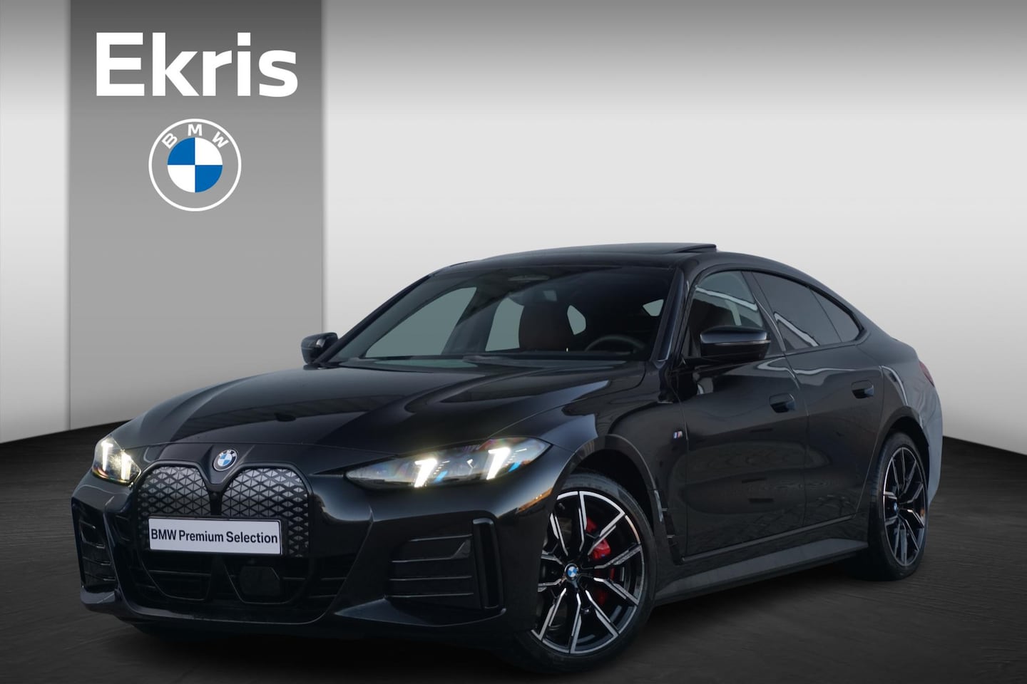 BMW i4 - eDrive40 M Sportpakket Pro 19'' / Individual Interieur / Schuif-/kanteldak / Elektrisch ve - AutoWereld.nl