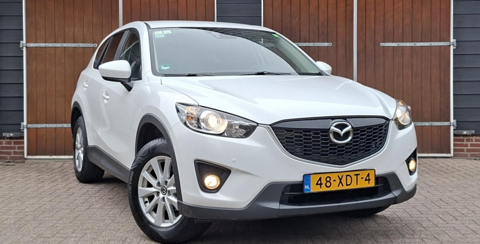 Mazda CX-5 - 2.0 TS 2WD 2.0 TS+ 2WD, Bluetooth, NAP, Trekhaak, 4 seizoensbanden - AutoWereld.nl