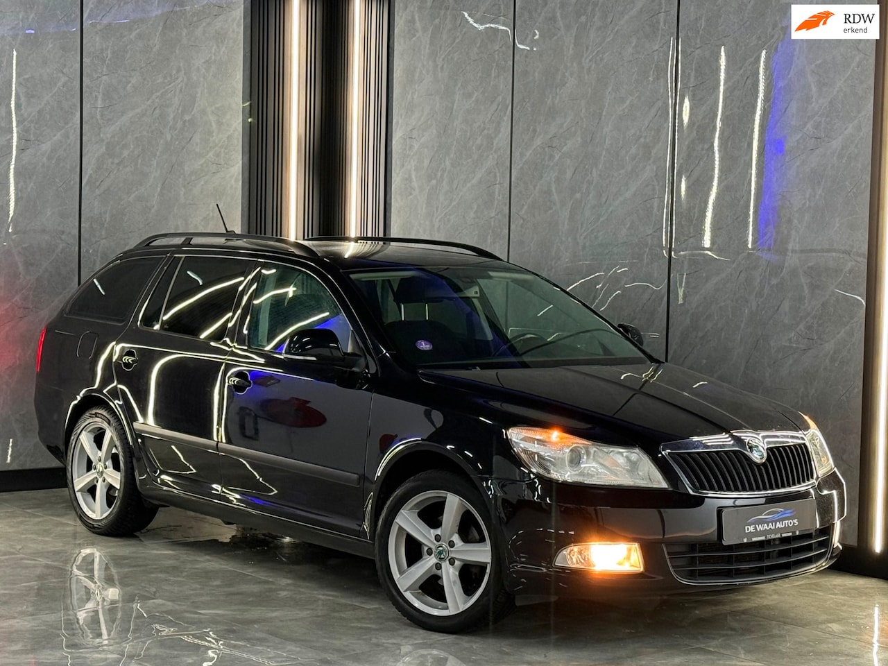 Skoda Octavia Combi - 1.2 TSI Ambition Business Line Xenon | Park Sensor | Navi | Trekhaak | Airco | Boekjes - AutoWereld.nl