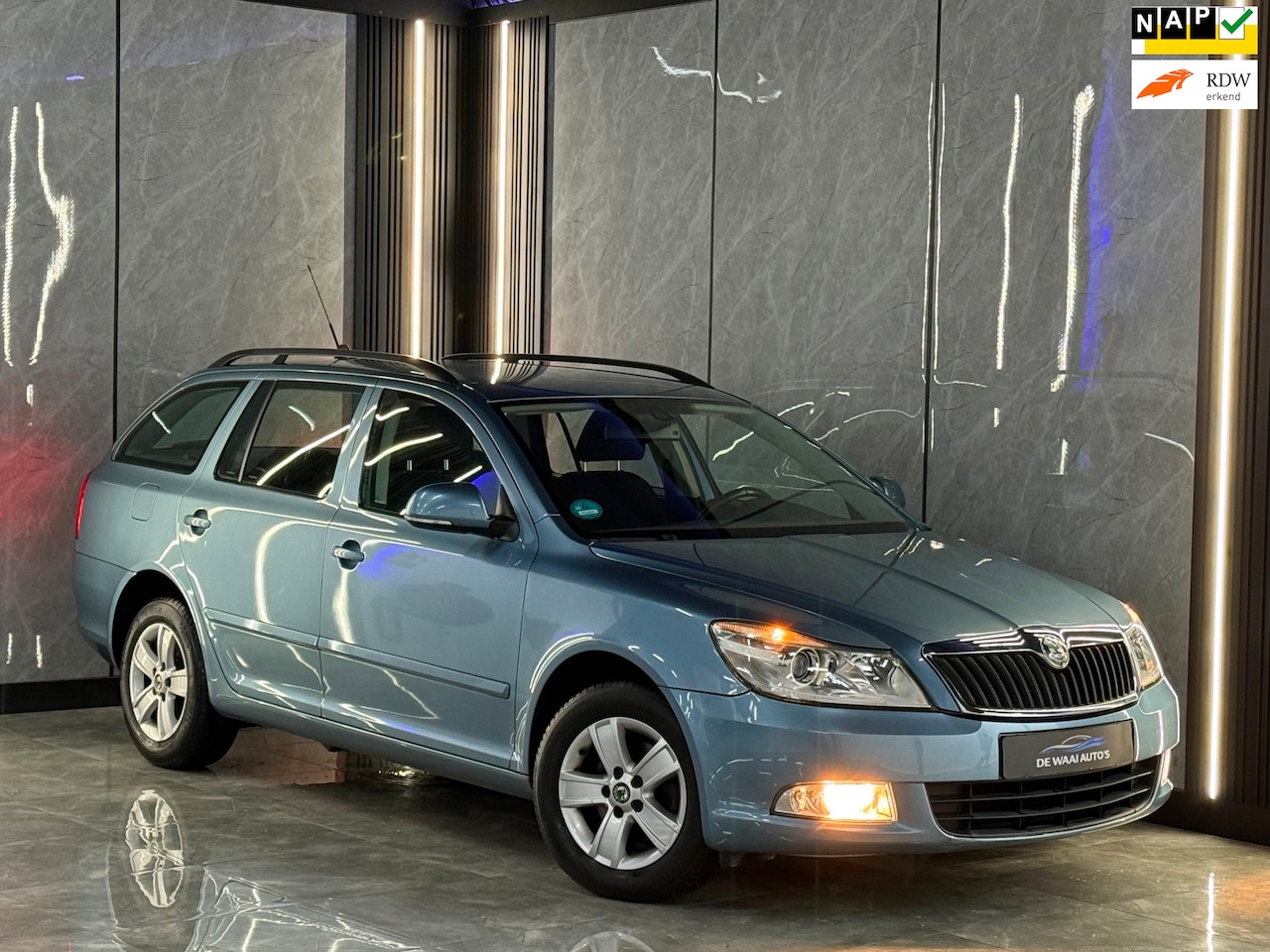 Skoda Octavia Combi - 1.4 TSI Ambition Business Line Xenon | Park Sensor | Navi | Trekhaak | Nap | Boekjes - AutoWereld.nl