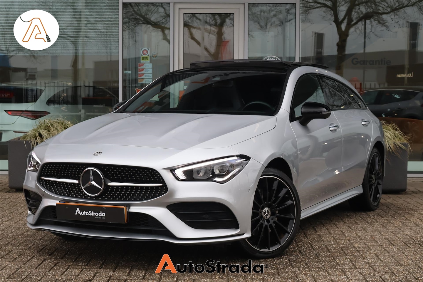 Mercedes-Benz CLA-klasse Shooting Brake - 250e AMG-Line 218pk | Sfeer | Camera | Pano | Cruise | Climate | Navi | LED | Night Pakket - AutoWereld.nl