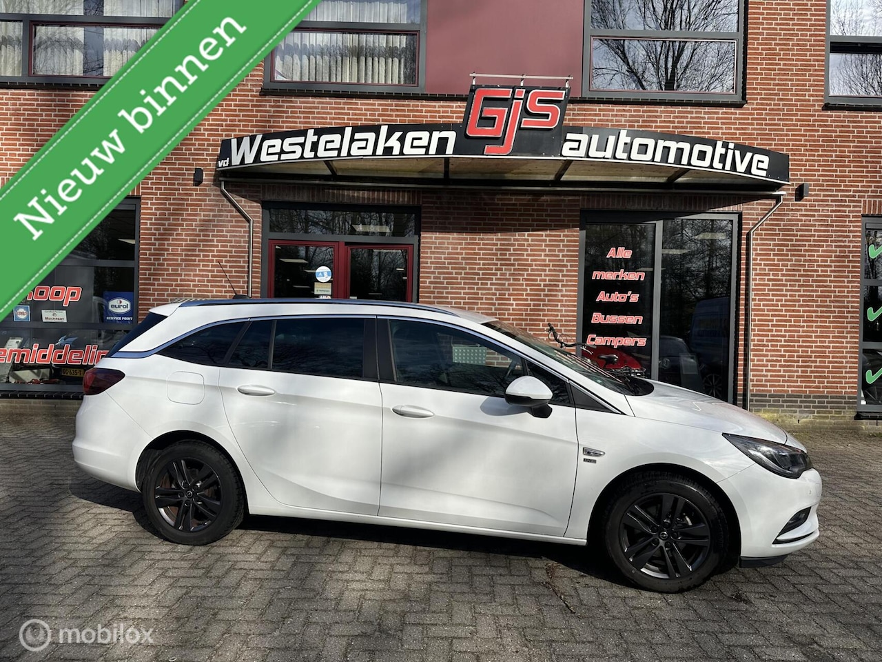 Opel Astra Sports Tourer - 1.0 Turbo 120 Jaar Edition 1.0 Turbo 120 Jaar Edition - AutoWereld.nl