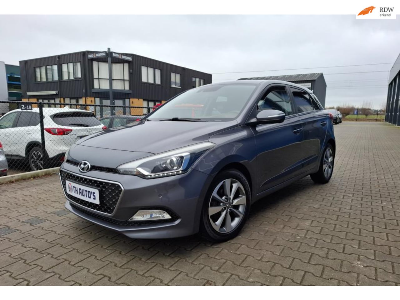 Hyundai i20 - 1.4 i comfort automaat/ airco/cruise control/Stoelverwarming - AutoWereld.nl