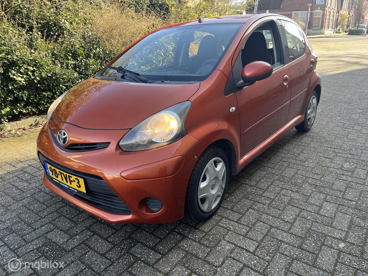 Toyota Aygo - 1.0 VVT-i Comfort Orange 1.0 VVT-i Comfort Orange - AutoWereld.nl
