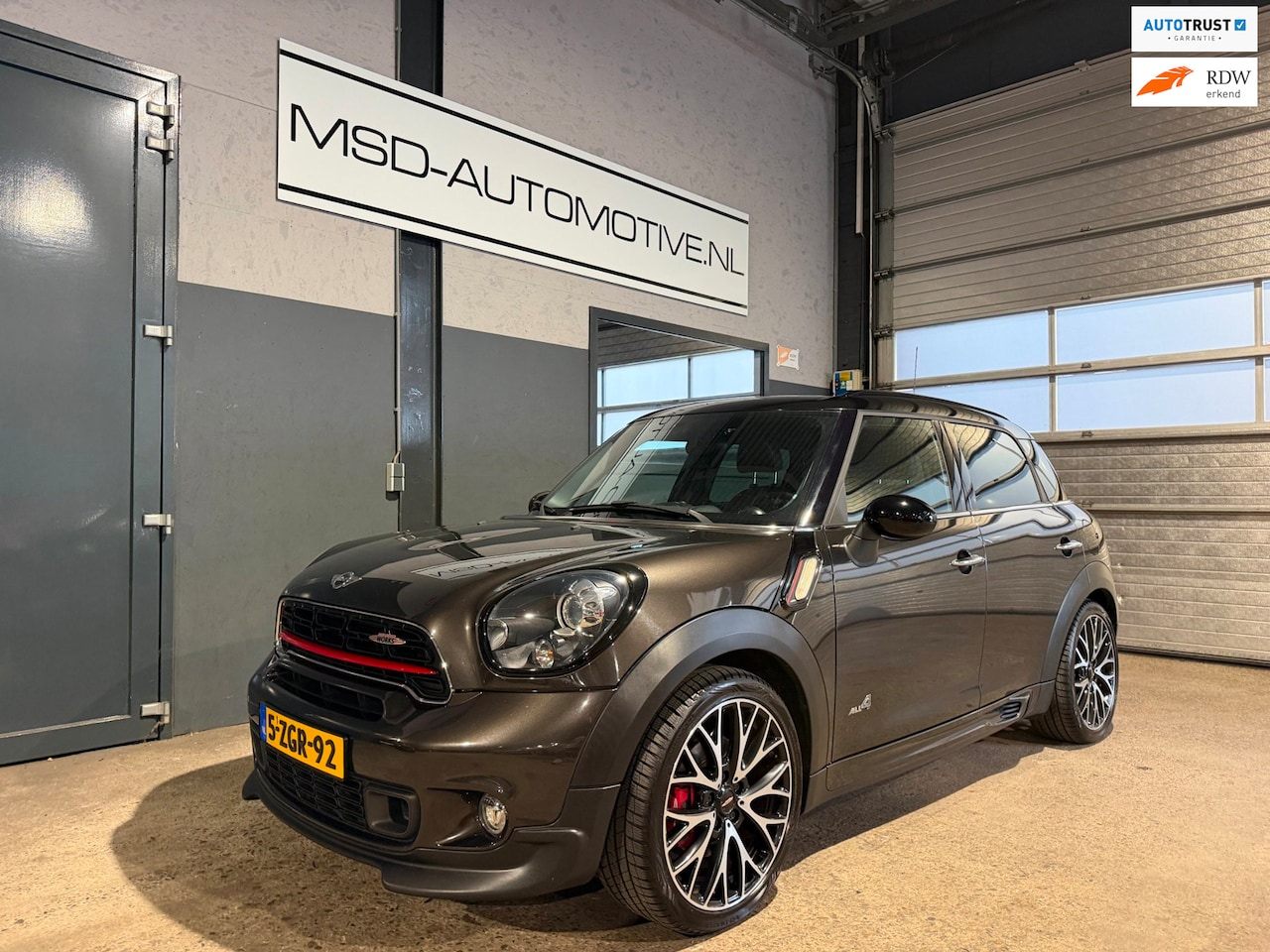 MINI Countryman - Mini 1.6 John Cooper Works ALL4 Chili Panoramadak Leer NAP - AutoWereld.nl