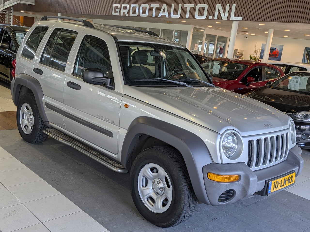 Jeep Cherokee - 2.4i Sport Plus Airco, Cruise Control, Trekhaak, Stuurbekrachtiging - AutoWereld.nl