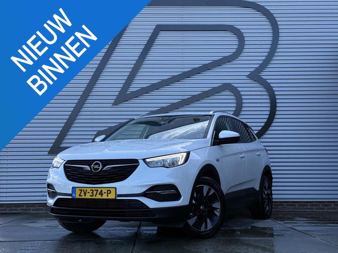 Opel Grandland X - 1.2 Turbo Business + 2e Eigenaar|Navi|Clima|Cruise|Carplay|Trekhaak|PDC|Dealer onderhouden - AutoWereld.nl