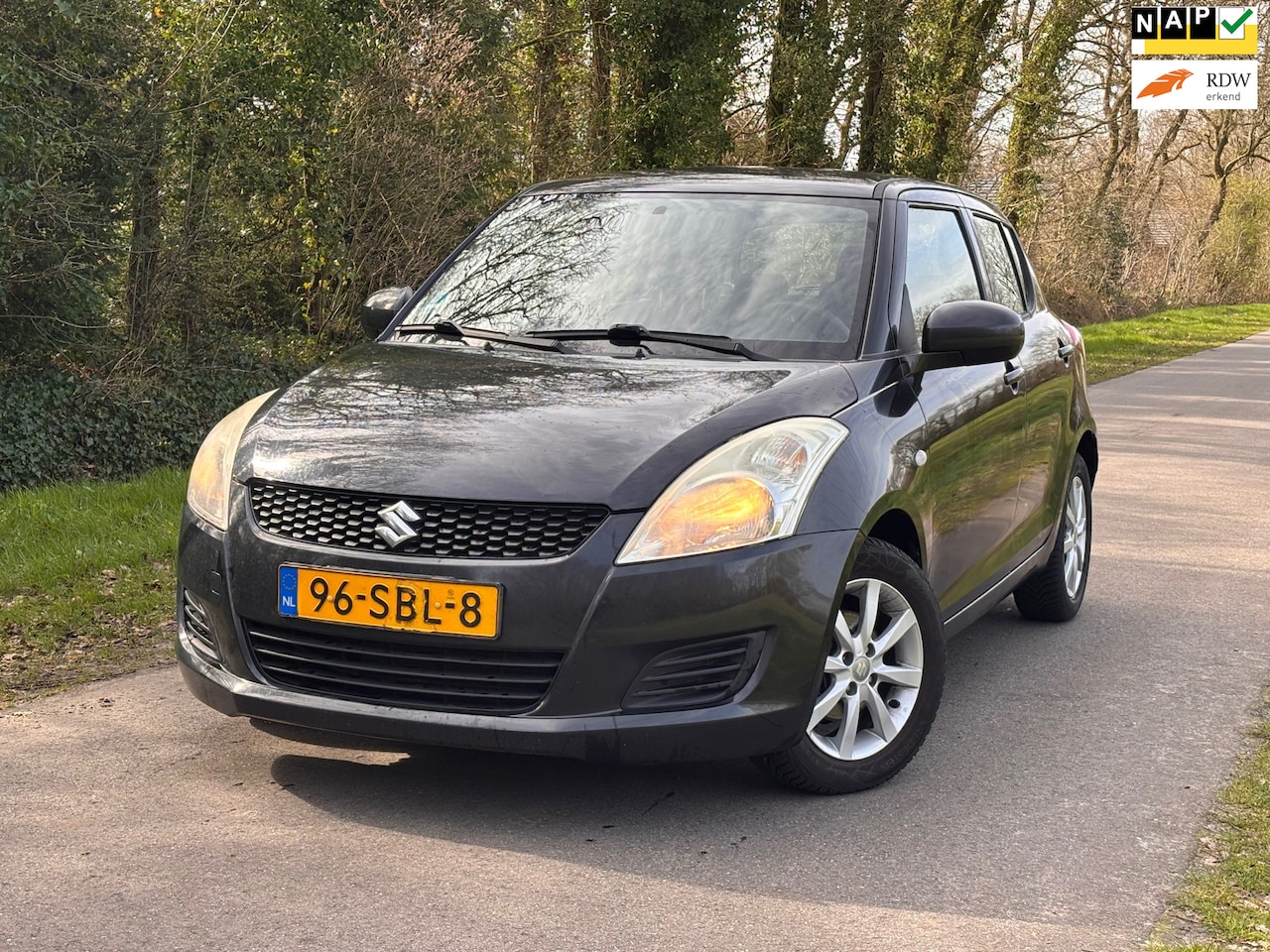 Suzuki Swift - 1.2 Comfort EASSS | Airco + Stoelverwarming | - AutoWereld.nl