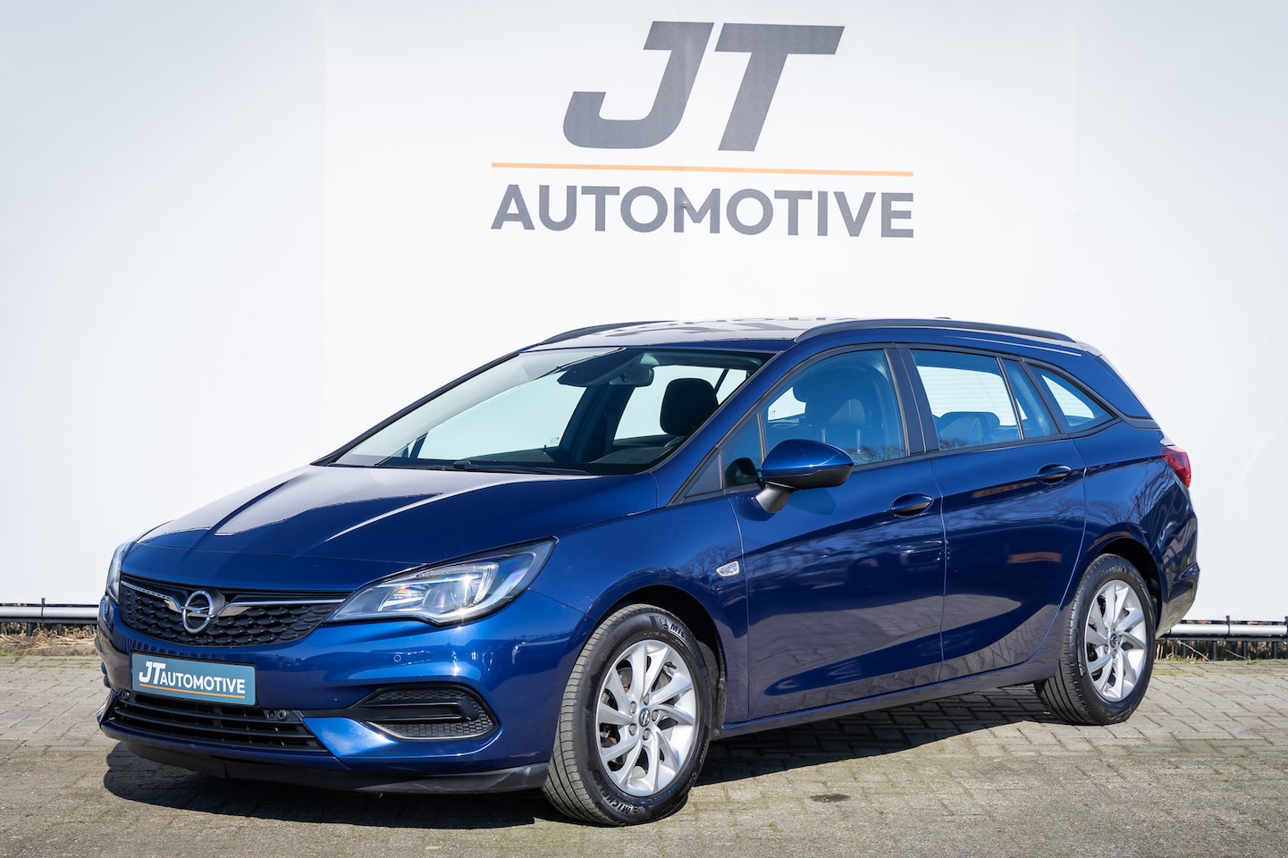 Opel Astra Sports Tourer - 1.2 Edition Parkeersensoren | Trekhaak | Cruise Control | CarPlay | Climate control - AutoWereld.nl