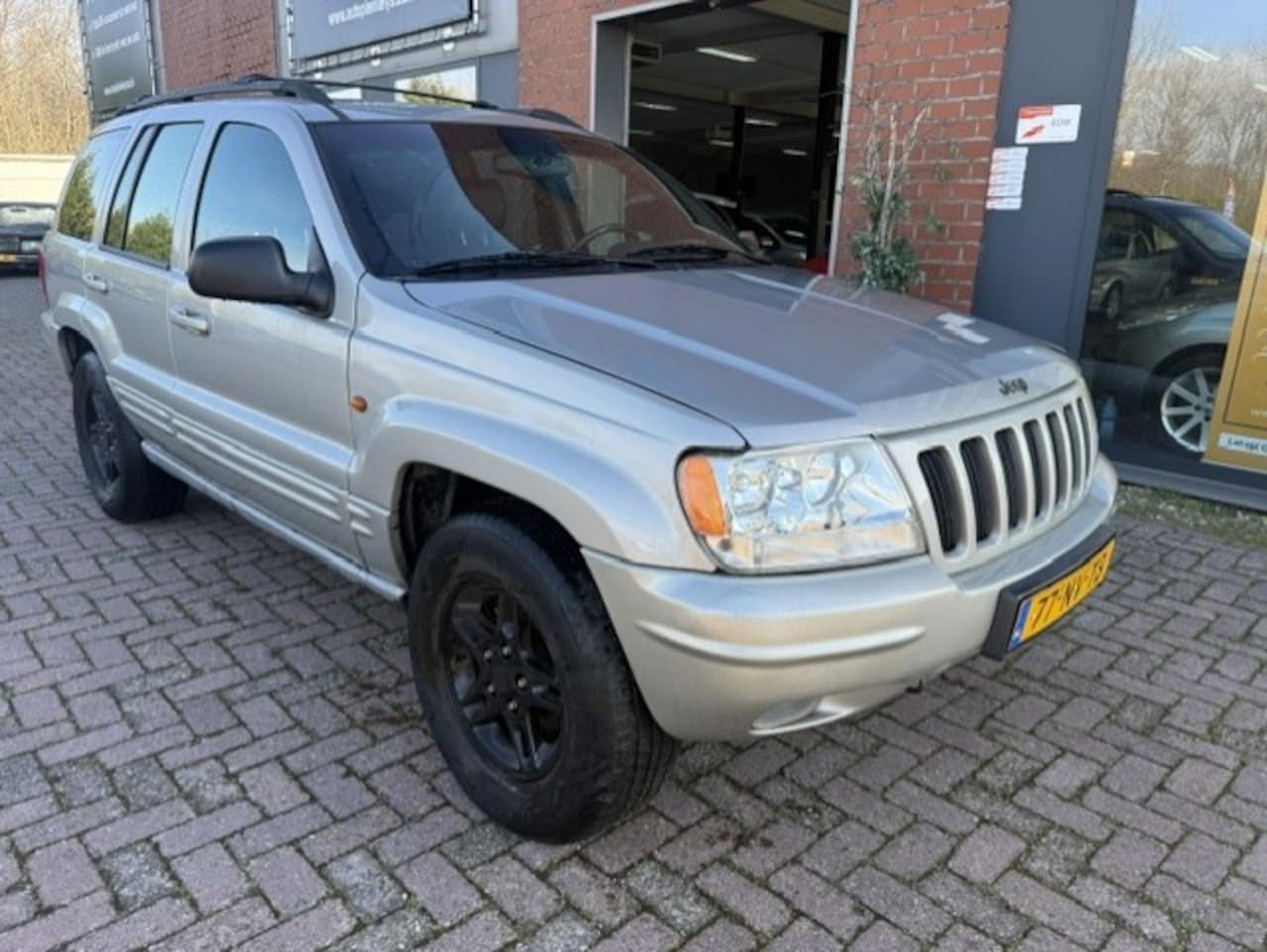Jeep Grand Cherokee - 4.7i V8 Limited AUT, LPG-G3 Leer - AutoWereld.nl