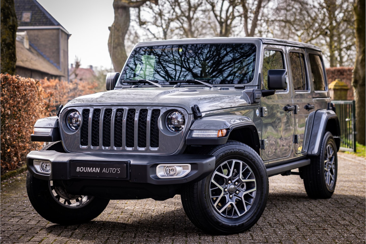 Jeep Wrangler Unlimited - 4xe 380 Sahara Sting Gray Adaptive Cruise - AutoWereld.nl