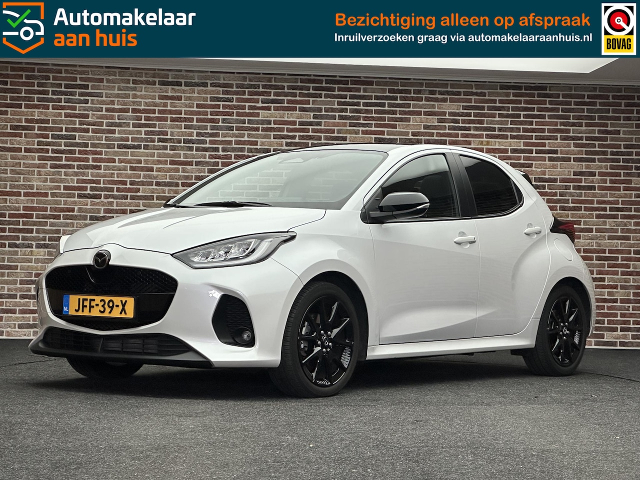 Mazda 2 Hybrid - 1.5 Homura Plus Panoramadak Headup Camera - AutoWereld.nl