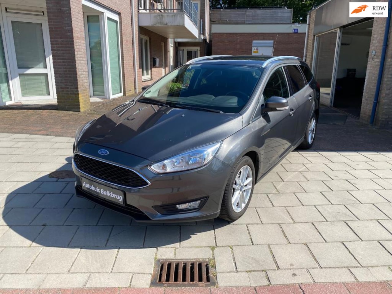 Ford Focus Wagon - 1.0 Titanium Edition airco lm velgen cruisctrol el ramen 91087 km - AutoWereld.nl