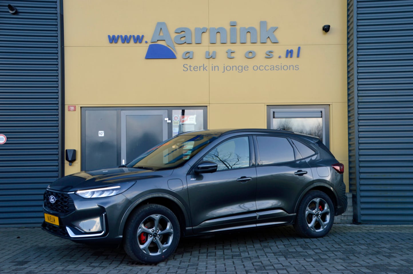 Ford Kuga - 5x 2.5 PHEV hybride 242 pk St-line X technopack, camera, winterpack, trekhaak, agr stoelen - AutoWereld.nl