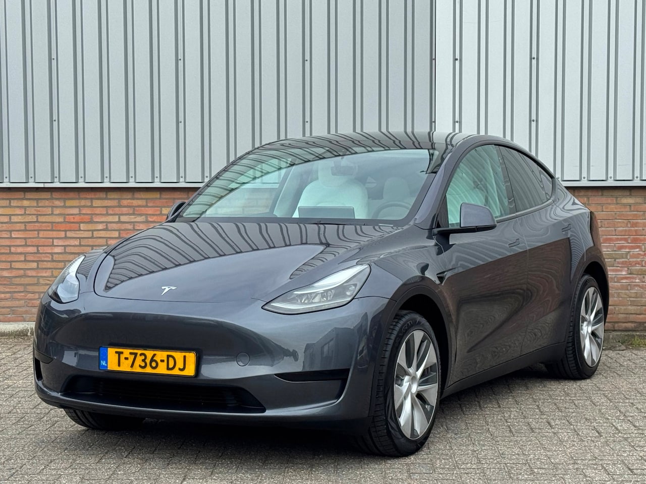Tesla Model Y - RWD 58 kWh LFP/ 94% SoH/ Full Self Drive/ Wit Leder - AutoWereld.nl