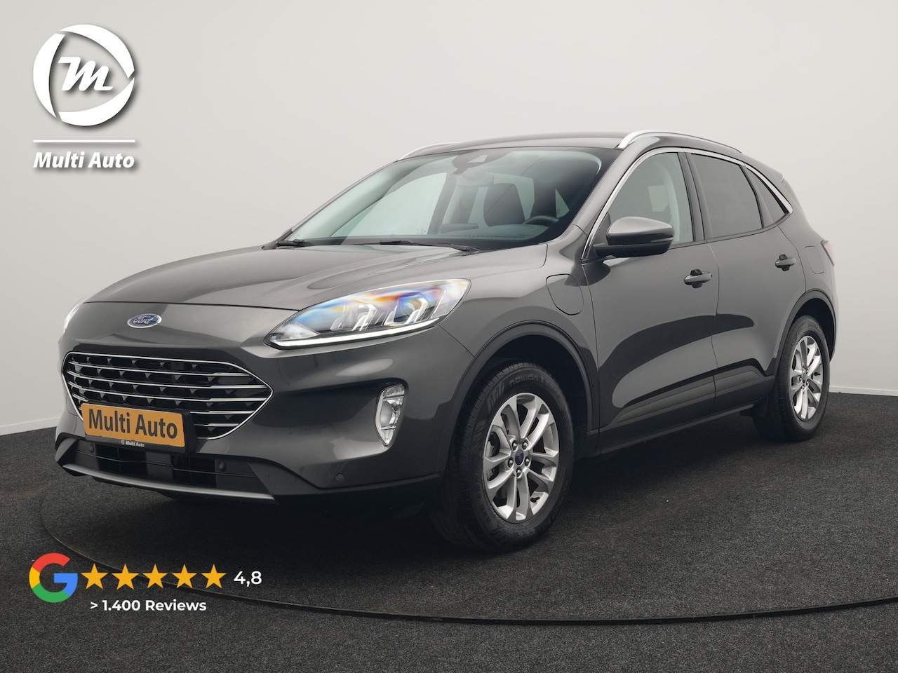 Ford Kuga - 2.5 Titanium PHEV 225pk Dealer O.H. | Trekhaak Afn. | Camera | Stoelen & Stuur Verwarmd | - AutoWereld.nl