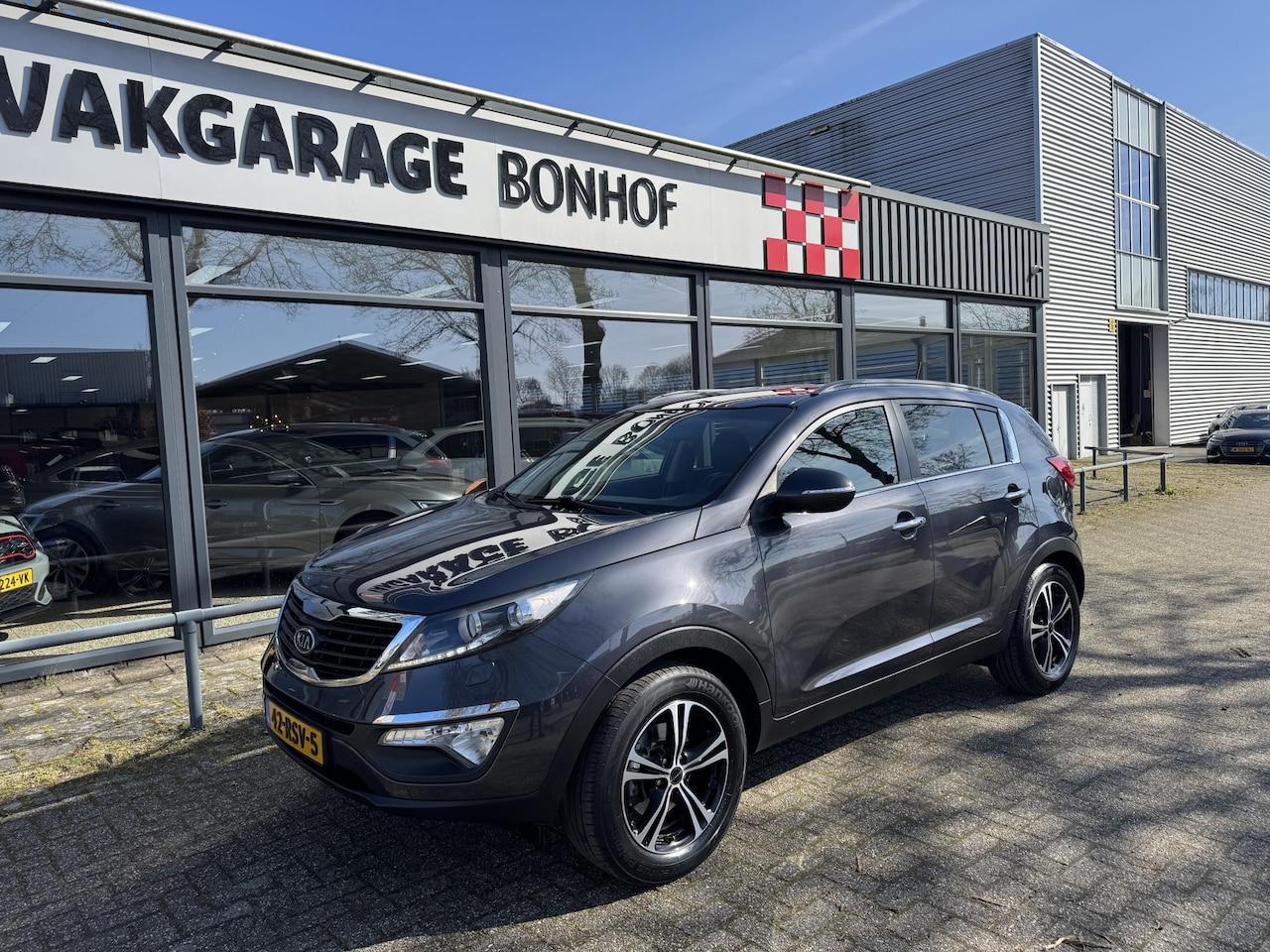 Kia Sportage - 1.6 GDI ISG X-clusive CLIMA-CAMERA-TREKHAAK - AutoWereld.nl