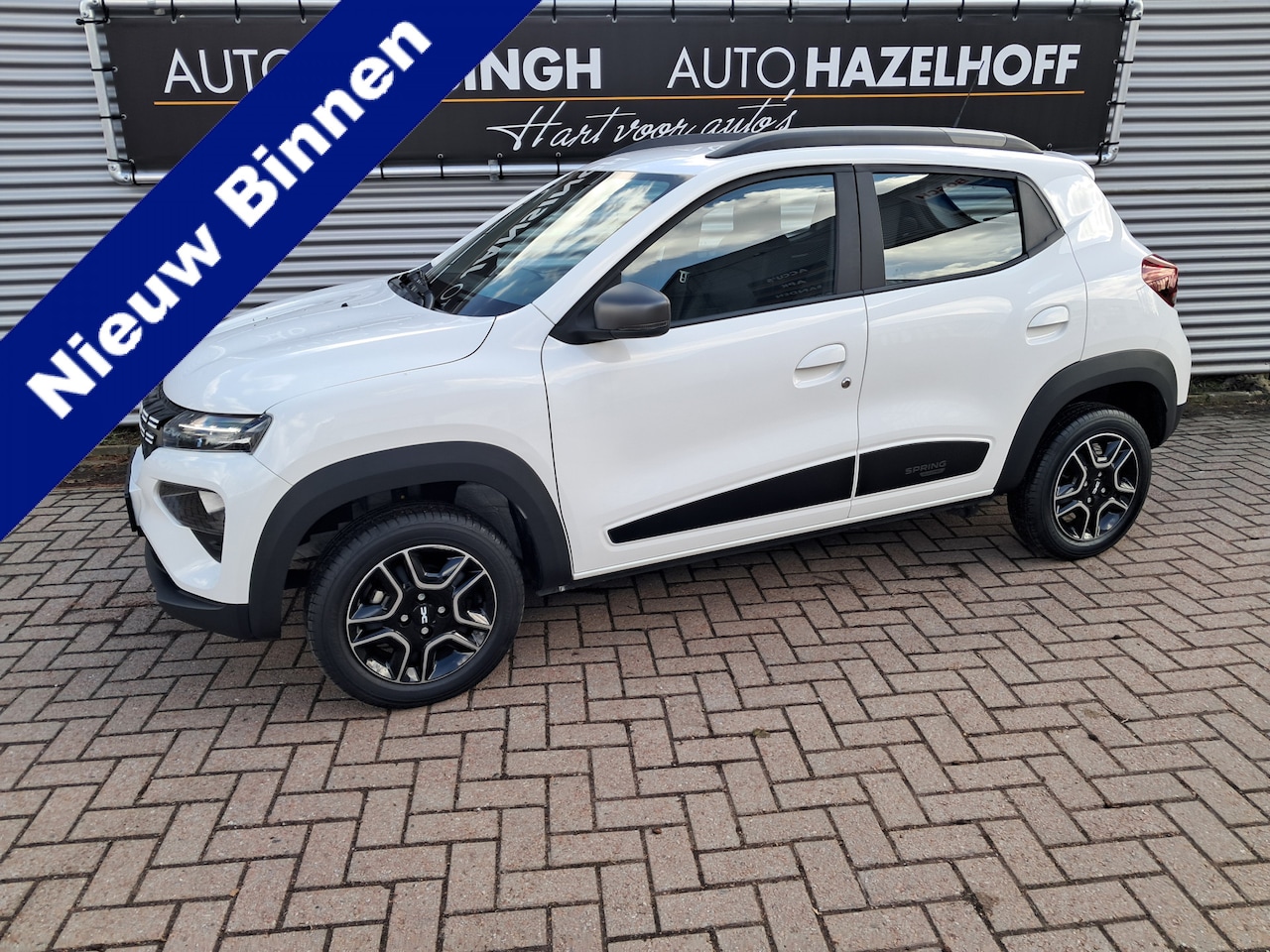 Dacia Spring - Expression 27 kWh Automaat 100% Elektrisch 14.254 km!!! | Airco | Camera | Navigatie | 1e - AutoWereld.nl